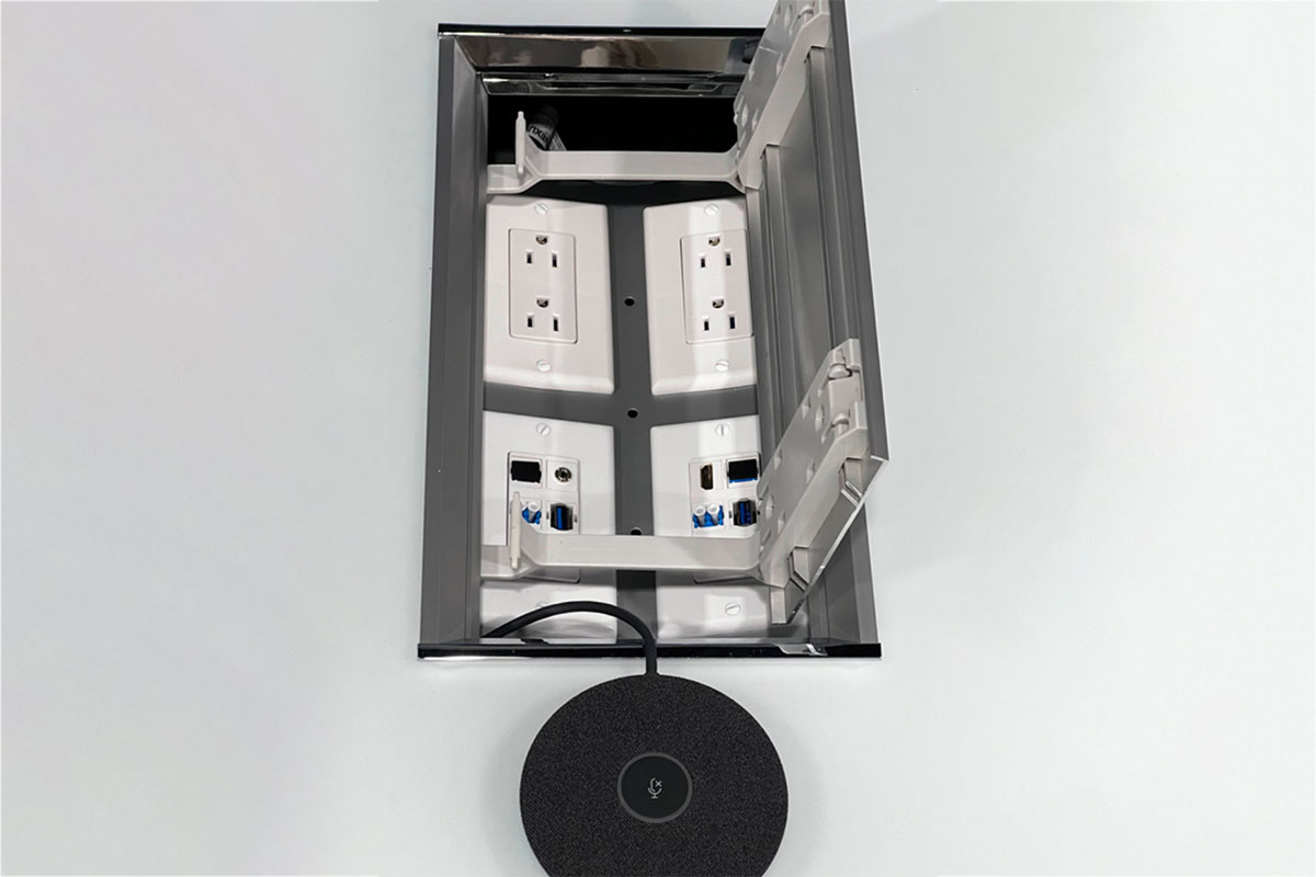 A power outlet after installing computer hardware with network cabling in Long Island.